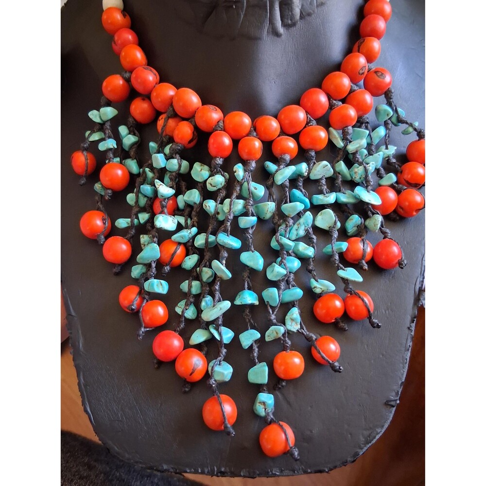 Turquoise chipped Macramรฉ style fringe teirred bib necklace w/white & orange nat